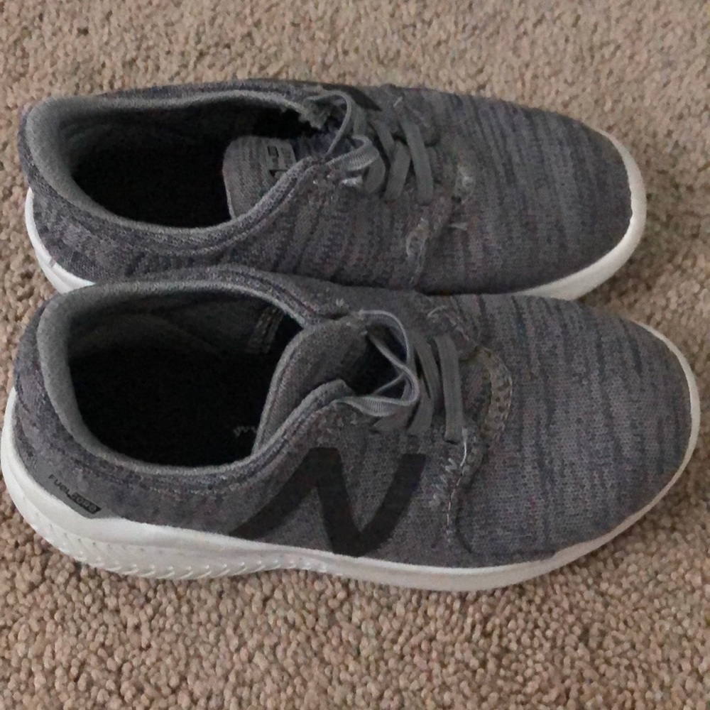 Boys new balance sneakers.